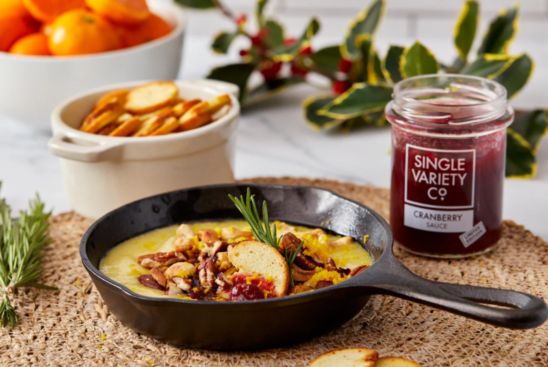 Baked Brie Fondue with Cranberry Sauce, Toasted Nuts & Orange